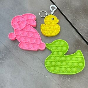 Pop it Pink and Yellow Duck Pop It Puzzle Game